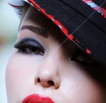 stock-photo-portrait-of-the-beautiful-sexy-woman-with-red-lips-in-modern-black-hat-151730330